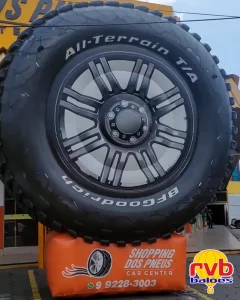 Painel Inflavel Shopping Dos Pneus [loja De Pneus] [automotivo] A Imagem Mostra Um Inflavel Em Forma